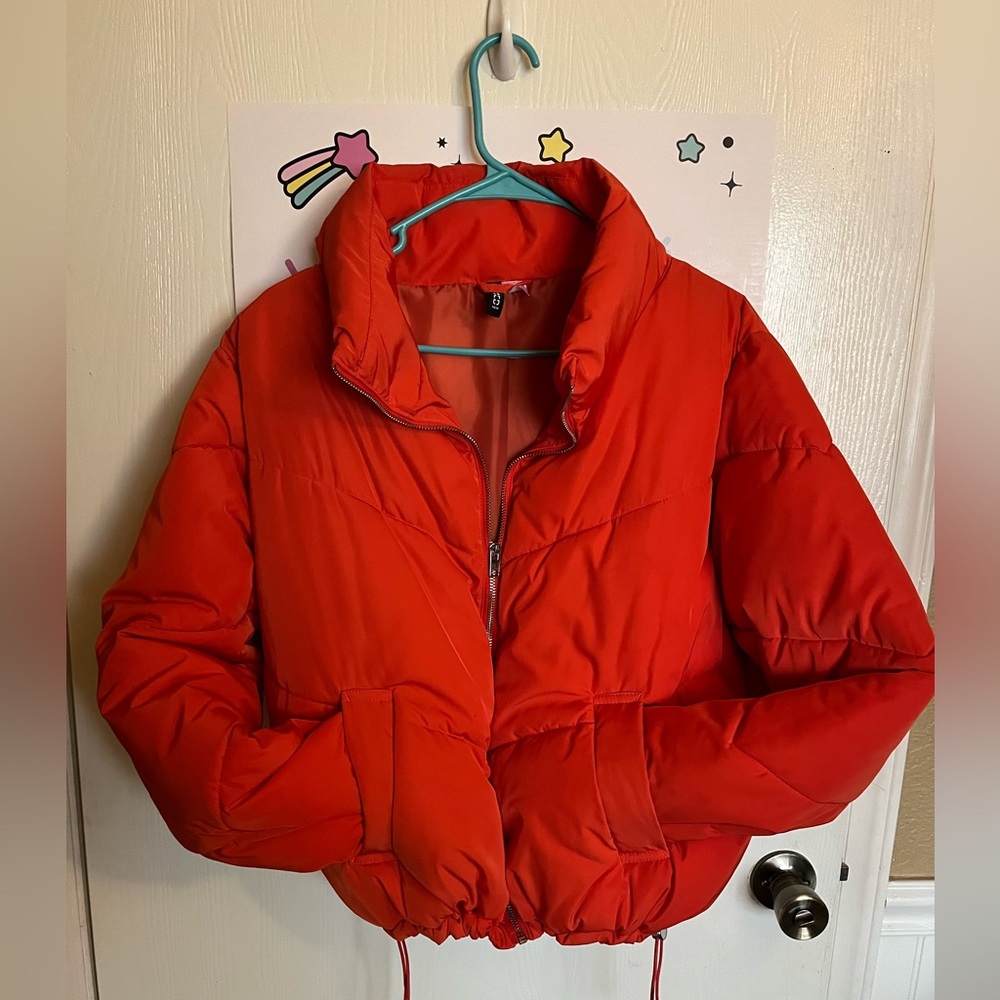 Women’s orange puffer jacket